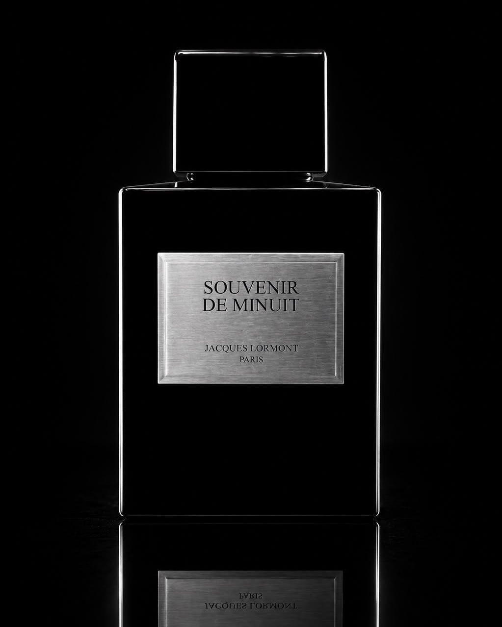 Flacon noir Souvenir de Minuit Lormont Paris avec plaque métallique argentée 